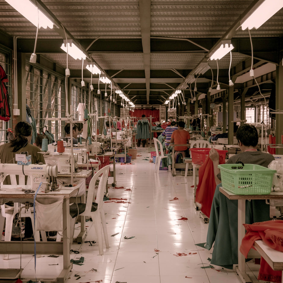A woman in an Asian fast fashion factory
