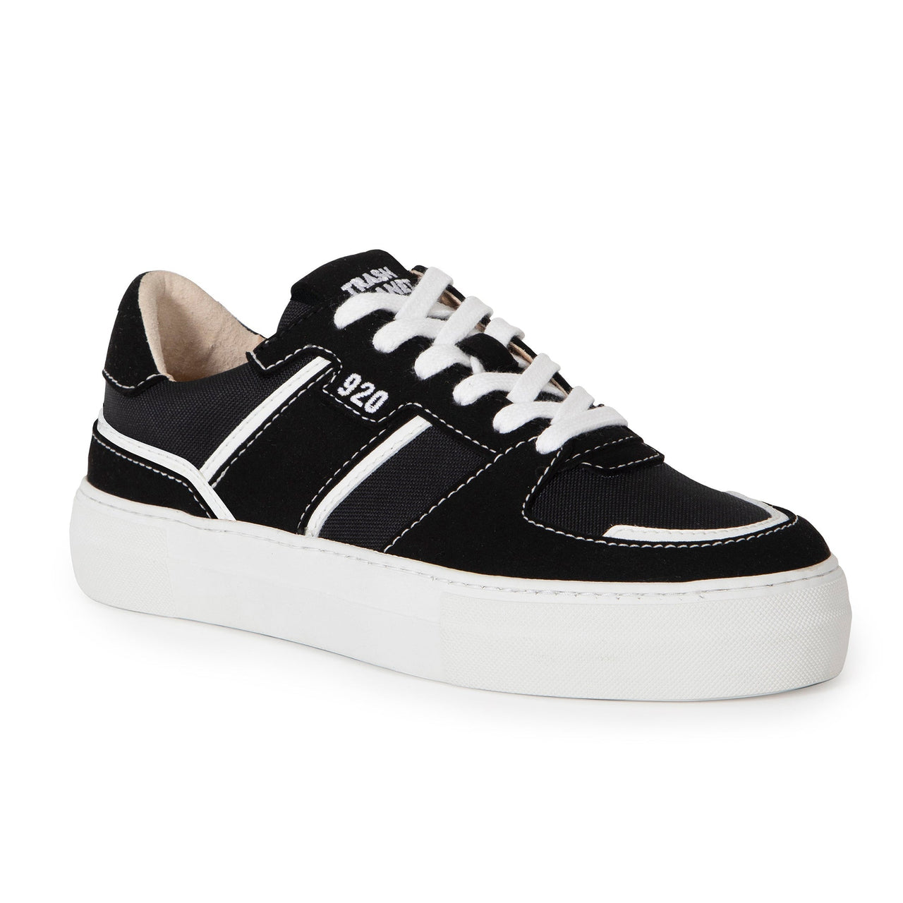 Skate style vegan sneaker in black and white made from recycled plastic bottles, ocean plastic and fruit and vegetable materials